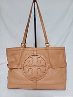 Front view showing logo medallion, overall leather condition