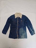 Full view of front of Wrangler sherpa lined denim jacket