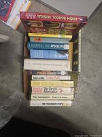 Top view of box showing multiple book spines and covers
