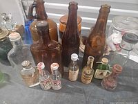 Group shot showing all bottles and decanters together on table