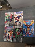 Five comics laid out showing all covers