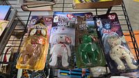 All four sealed Ty International Bears on rack