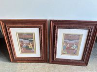 Front view of both framed artworks side by side