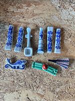 Group shot showing all eight ceramic chopstick rests