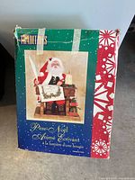 Retail box front showing Traditions Père Noël Animé Vivant Santa figurine