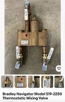 Front view showing full valve, ball valves, tags and model label