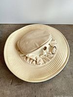 Top view of beige Tilley Endurables wide-brim hat