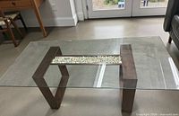 Full view of table assembled with glass top