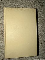 Front cover of beige hardcover book