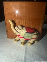 left view showing trunk up and painted details