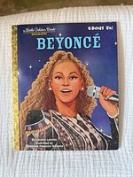 Front cover showing title, artwork of Beyoncé, author and illustrator credits