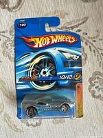 Front view of sealed Hot Wheels CUL8R package showing car and card details