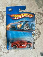 Front of sealed Hot Wheels package showing car and card art