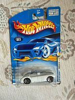 Front of sealed Hot Wheels package showing car and graphics