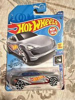 Front of sealed Hot Wheels Grand Cross package