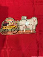 Full view of ceramic wall plaque on red background