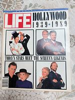 Front cover showing title and actor montage