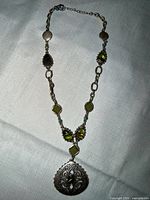 Full necklace laid flat on fabric