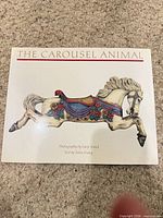 Front cover of The Carousel Animal book