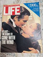 Front cover showing title, headline and 2000th issue note