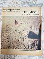 Front cover showing title, publication name and lunar surface image