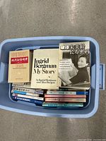 Overview of bin showing dictionary, autobiography and additional books