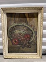 Full view of the framed still life painting