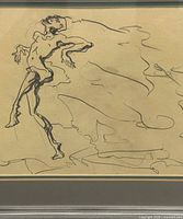 Close view of drawn figure on paper within mat