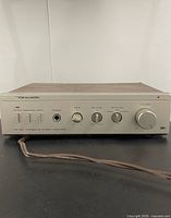 Front view showing entire amplifier, brand and model