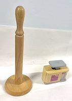 Overall shot of wood paper towel holder and Weight Watchers scale