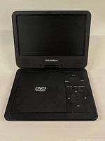 Front view with screen raised and disc lid closed