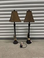Front view of both matching table lamps showing full height, bases, and shades