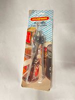 Front view of packaged Houseware butterfly can opener