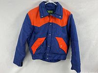 Full front view of colour-blocked puffer jacket