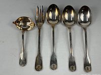 Full view of all five Christofle Shell silverplate serving pieces