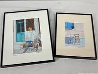 Both framed prints side by side to show size difference and frames