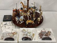 Full set on hardwood base with duplicate figurines and accessory items visible