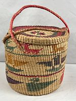 Full view showing basket body, lid, and handle