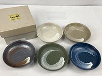 Set of five ceramic bowls with box