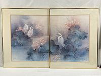 Full view of both framed prints side by side