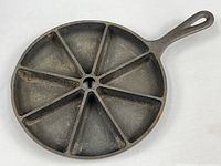 Top view showing 8-wedge divided cast iron cornbread skillet
