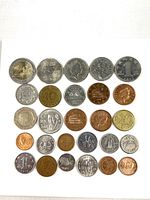Overall view of 25 assorted coins arranged in 5×5 grid