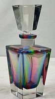 Full view of rainbow crystal decanter with stopper