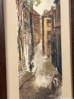 Close view of artwork showing street scene detail