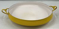 Full view of yellow Dansk Kobenstyle paella pan showing size and color