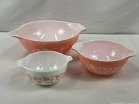 Three Pink Gooseberry Cinderella mixing bowls various sizes