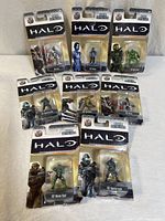 Group shot of nine sealed Halo Nano Metalfigs in blister packaging