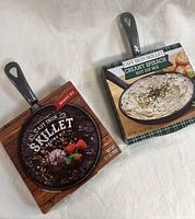 Both boxed mini cast iron skillet kits front view