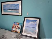 All three art pieces on wall and bed for scale and framing detail