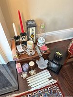 Group view of candles, candleholders and lanterns